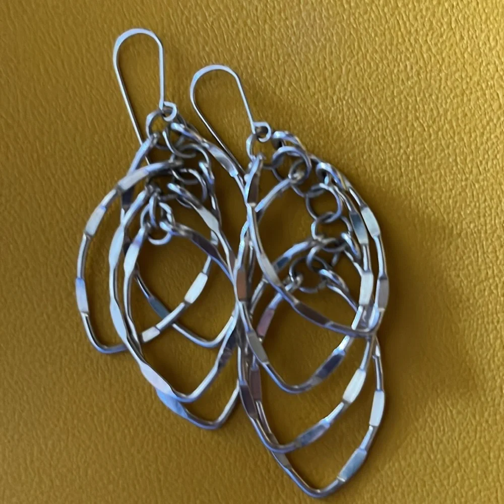 Faceted sparkly faceted swingy silver swingy artisan layered earrings NWOT